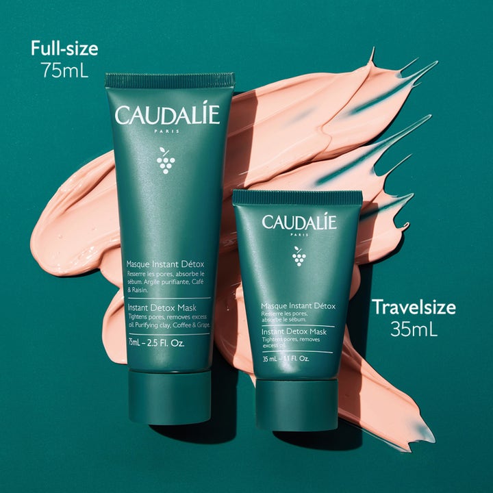 Caudalie Instant Detox Mask 75 ml puhdistava kasvonaamio tuubissa vaaleanpunaisella voidetekstuurilla.