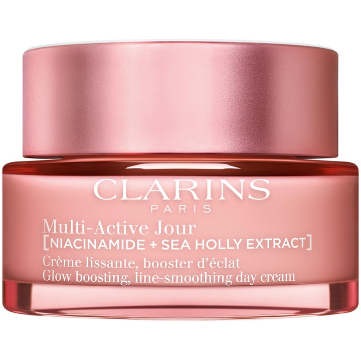 Clarins Multi-Active Jour 50 ml silottava päivävoide tuo heleyttä vaaleanpunaisessa lasipurkissa metallisella kannella.