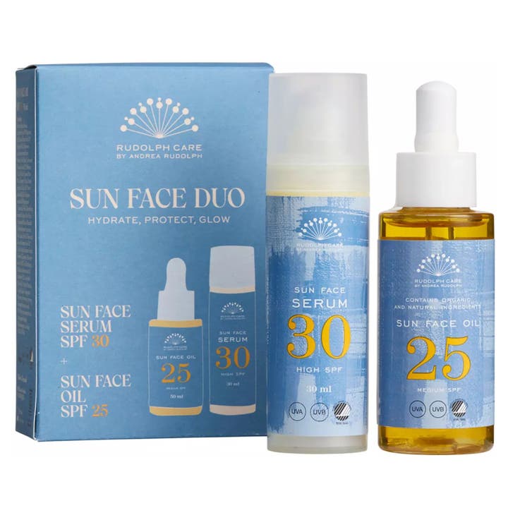 Rudolph Care Sun Face Duo 30 ml ja 50 ml suojaava aurinkosuoja sinisessä pakkauksessa seerumina ja pipetillisenä öljynä.