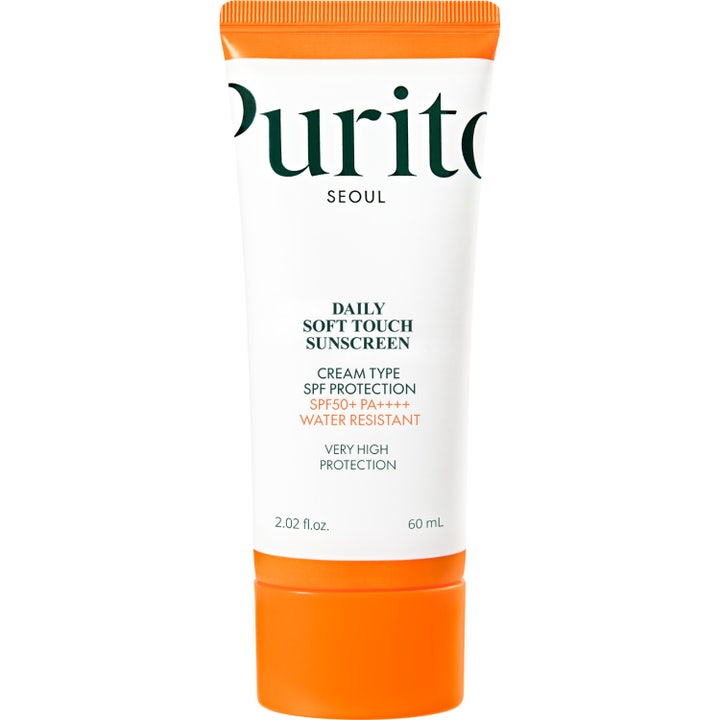 Purito Seoul Daily Soft Touch Sunscreen 60 ml keramidia sisältävä aurinkovoide valkoisessa tuubissa oranssilla korkilla