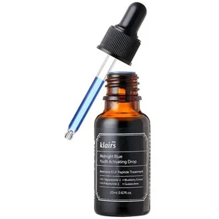 Klairs Midnight Blue Youth Activating Drop 20ml nuorentava seerumi tummassa lasipullossa ja pipetissä sinistä nestettä