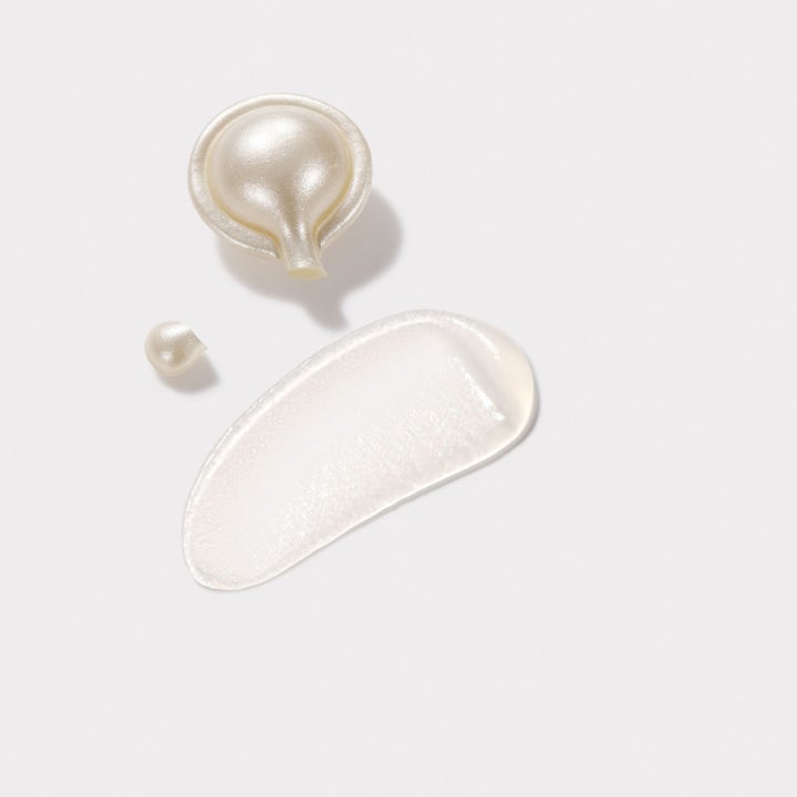 Elizabeth Arden Ceramide Capsules Hyaluronic Acid + Peptides 30 kpl kosteuttava seerumi helmiäiskapseli ja kirkas koostumus