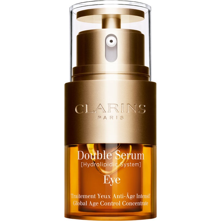 Clarins Double Serum Eye 20 ml silmänympärysseerumi vähentää turvotusta kultaisessa pumppupullossa
