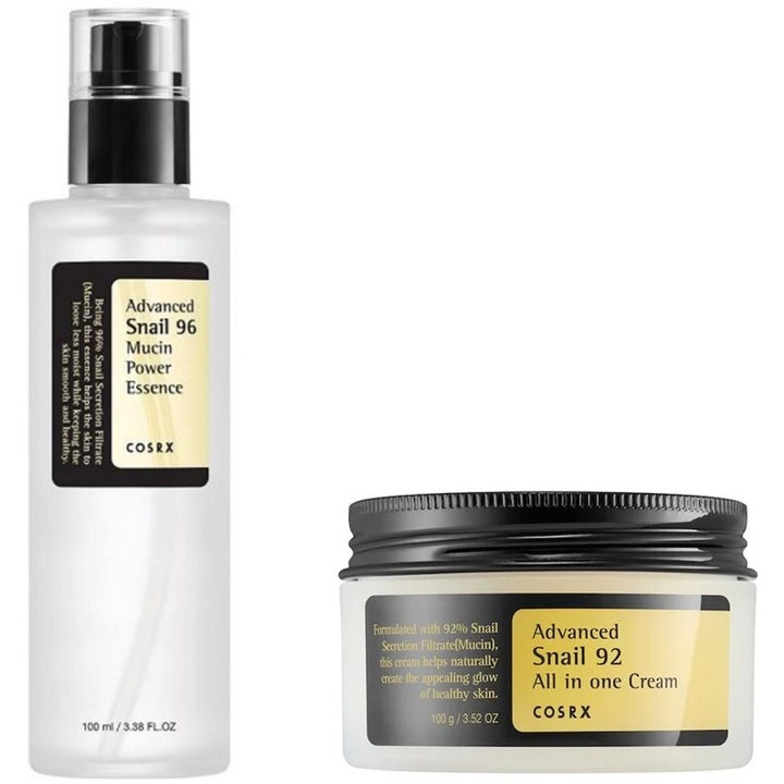 COSRX Advanced Snail 96 Essence 100ml ja 92 Cream 100g heleyttävä setti pumppupullossa ja purkissa mustilla kansilla.