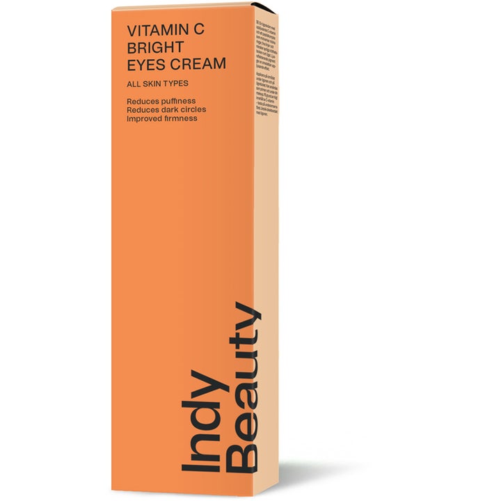 Indy Beauty Vitamin C Bright Eyes Cream 15 ml kirkastava silmänympärysvoide tummille silmänalusille oranssissa pakkauksessa.