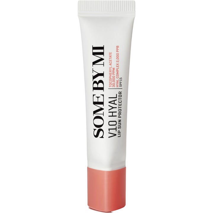 Some By Mi V10 Hyal Lip Sun Protector 7 ml kosteuttava huulivoide SPF15 valkoisessa tuubissa korallinvärisellä korkilla