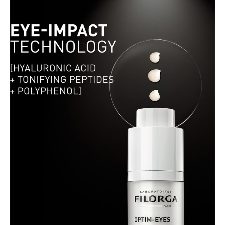 Filorga Optim-Eyes 15 ml silmänympärysvoide valkoisessa pullossa, kolme voidetippaa ja hyaluronihappoa sisältävä teho.