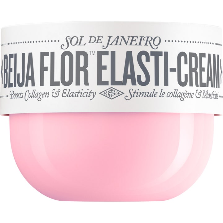 Sol de Janeiro Beija Flor Elasti-Cream kiinteyttävä vartalovoide vaaleanpunaisessa purkissa valkoisella vyötteellä.