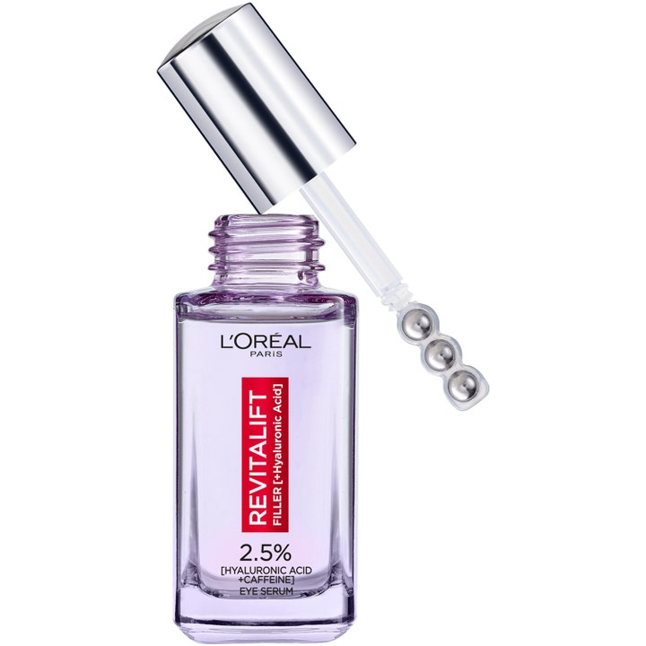 L'Oréal Paris Revitalift Filler 20 ml kosteuttava silmänympärysseerumi purppuraisessa lasipullossa metallikuulilla.