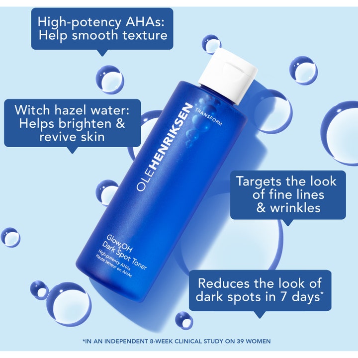 Ole Henriksen Glow2OH Dark Spot Toner 190 ml kirkastava kasvovesi sinisessä pullossa vesikuplien ympäröimänä.