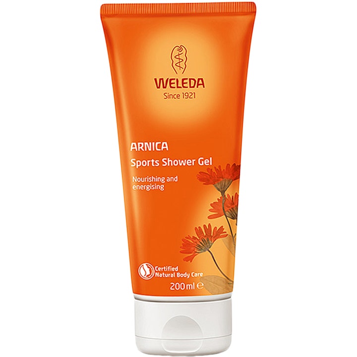 Weleda Arnica Sports Shower Gel 200 ml energisoiva suihkugeeli oranssissa tuubissa kukkakuvioilla