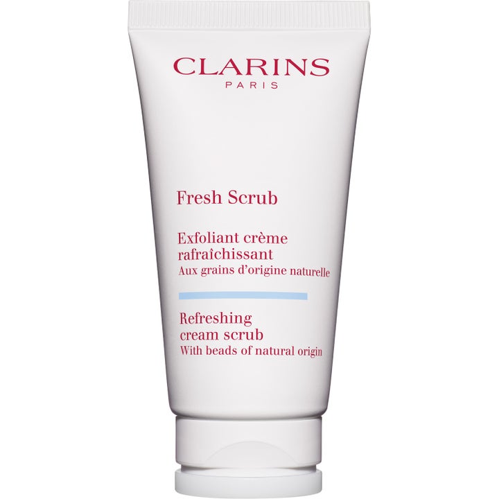 Clarins Fresh Scrub 50 ml kirkastava kuorintavoide valkoisessa tuubissa punaisella tekstillä ja vaaleansinisellä viivalla.