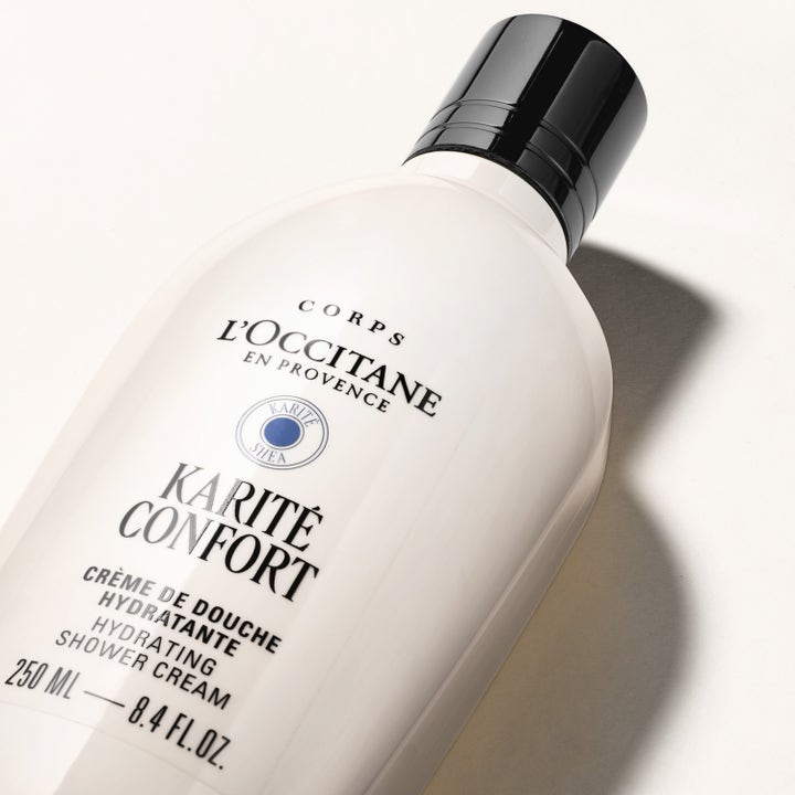 L'Occitane en Provence Shea Butter Body Shower Cream 250 ml kosteuttava suihkuvoide valkoisessa pullossa.