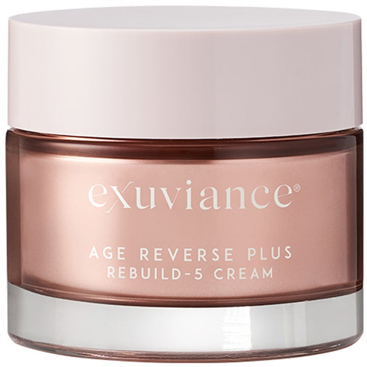 Exuviance Age Reverse Plus Rebuild-5 Cream kiinteyttävä kasvovoide rosekultaisessa lasipurkissa vaalealla korkilla