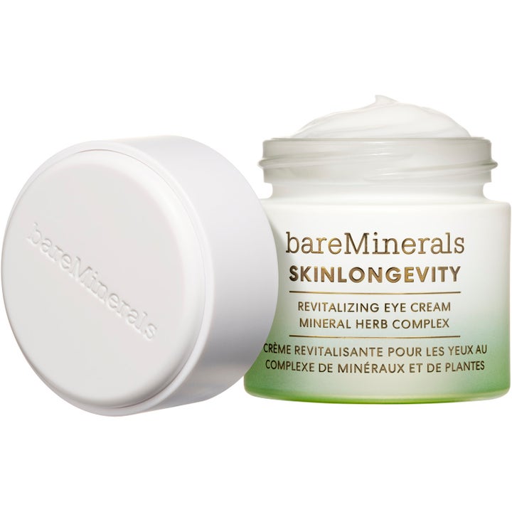 bareMinerals Skinlongevity Revitalizing Eye cream 15 g elvyttävä silmänympärysvoide avatussa valkovihreässä purkissa.