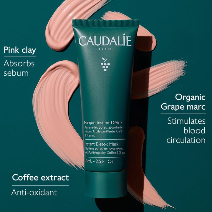 Caudalie Instant Detox Mask 75 ml talia imevä kasvonaamio vihreässä tuubissa vaaleanpunaisten savisivelyiden keskellä