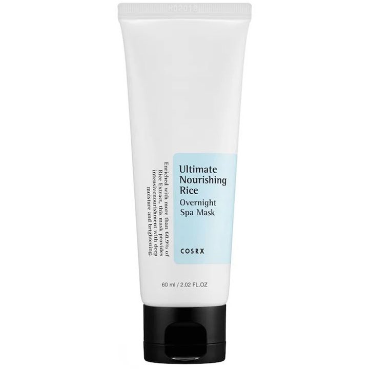 COSRX Ultimate Nourishing Rice Overnight Spa Mask 60 ml kirkastava yönaamio valkoisessa tuubissa mustalla korkilla