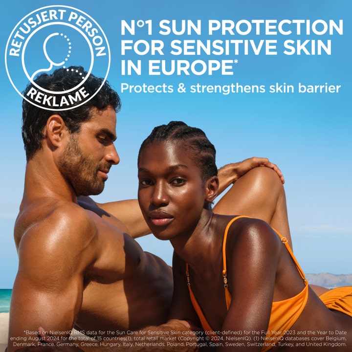 Garnier Ambre Solaire Sensitive Advanced 150 ml aurinkovoide suojaa herkän ihon suojamuuria pariskunnan ollessa rannalla