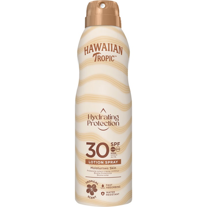 Hawaiian Tropic Hydrating Protection SPF 30 kosteuttava aurinkosuojasuihke vaaleassa aaltokuvioidussa pullossa.