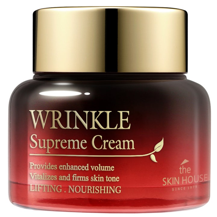 The Skin House Wrinkle Supreme Cream 50 ml kiinteyttävä kasvovoide tummanpunaisessa lasipurkissa kultaisella korkilla.