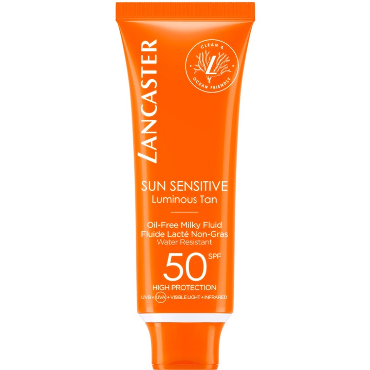 Lancaster Sun Sensitive Luminous Tan SPF 50 50 ml heleyttävä aurinkosuoja kasvoille oranssissa tuubissa.