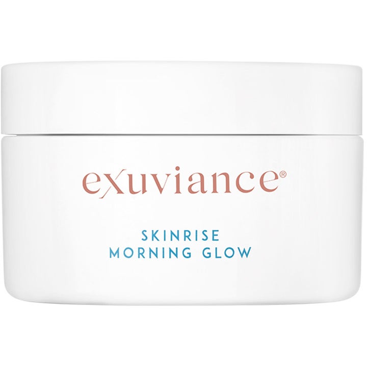 Exuviance Skinrise Morning Glow 36 kpl heleyttävät kasvotyynyt valkoisessa purkissa sinisellä tekstillä.