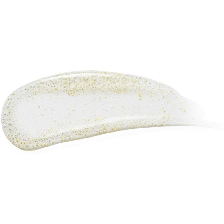 Origins GinZing Refreshing Scrub Cleanser 150 ml kirkastava kuorintageeli keltaisilla rakeilla.
