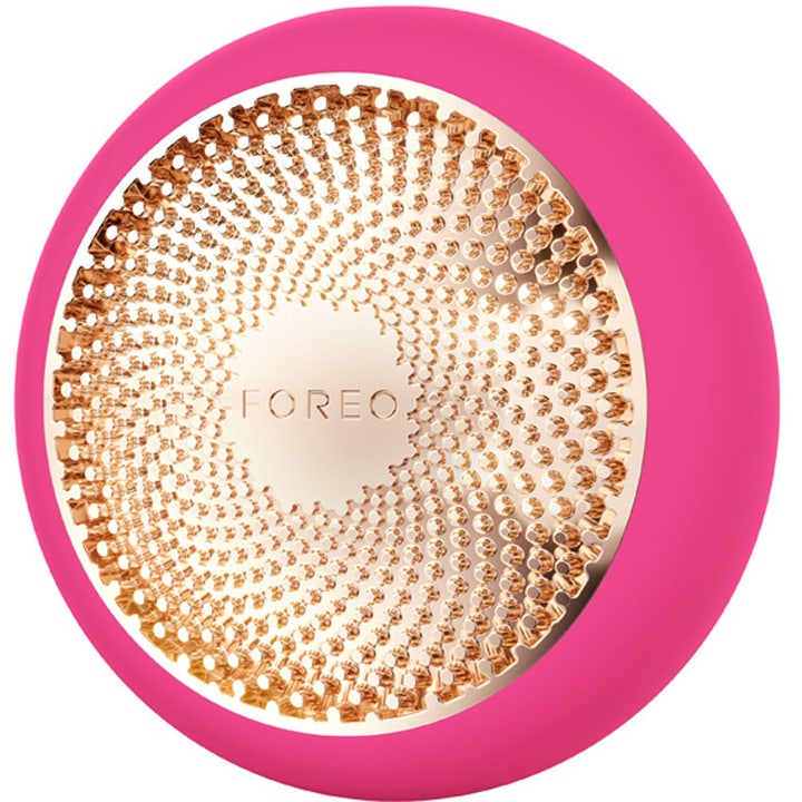 FOREO UFO 3 Fuchsia 1 kpl kosteuttava ihonhoitolaite fuksianpunainen pyöreä runko ja ruusukultainen teksturoitu pinta