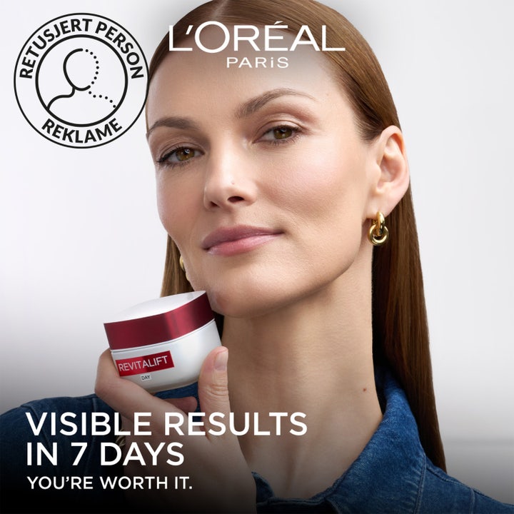 L'Oréal Paris Revitalift Day Cream 50 ml kiinteyttävä päivävoide avatussa purkissa, täyteläinen valkoinen koostumus