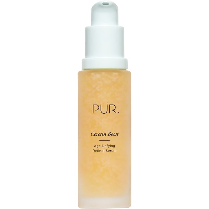 PÜR Ceretin Boost Age Defying Retinol Serum uudistava retinoliseerumi huurteisessa lasipullossa valkoisella pumpulla.