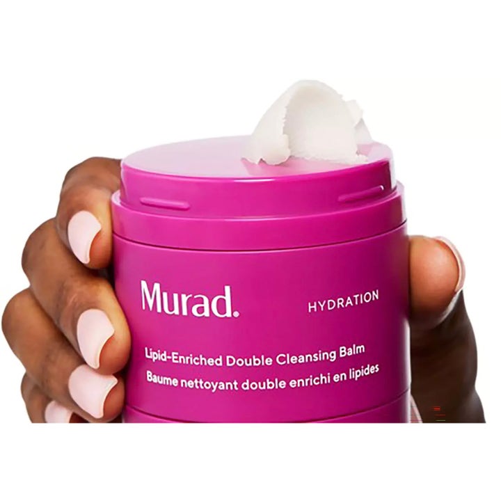 Murad Lipid-Enriched Double Cleansing Balm 50 ml kosteuttava puhdistusbalmi liilassa purkissa valkoisella koostumuksella.