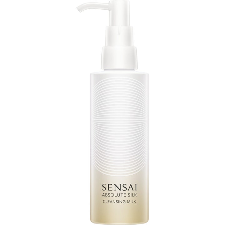 Sensai Absolute Silk Cleansing Milk 150 ml silottava puhdistusmaito valkoisessa kultahäivytteisessä pumppupullossa.