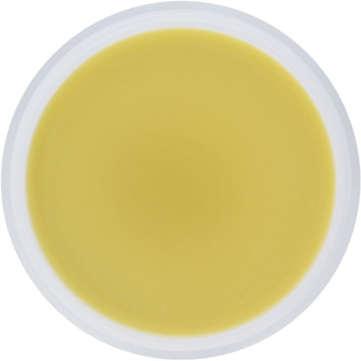 Maria Åkerberg Shea Balm 100 ml pehmentävä vartalovoide, jonka täyteläinen keltainen koostumus näkyy avatussa purkissa.