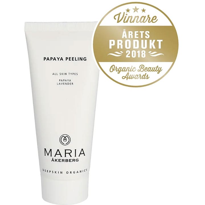 Maria Åkerberg Papaya Peeling 100 ml kirkastava kasvokuorinta valkoisessa tuubissa kultaisella palkintomerkillä.