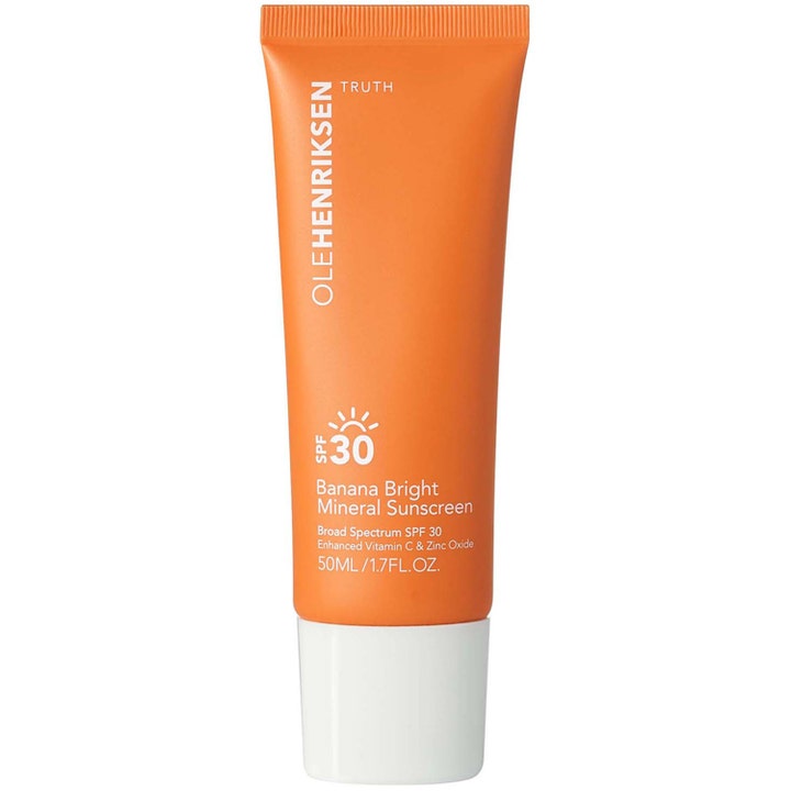 Olehenriksen Banana Bright Mineral Sunscreen 50 ml kirkastava aurinkovoide oranssissa tuubissa valkoisella korkilla.