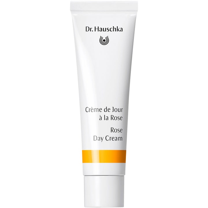 Dr. Hauschka Rose Day Cream 30 ml suojaava päivävoide valkoisessa tuubissa keltaisella raidalla.