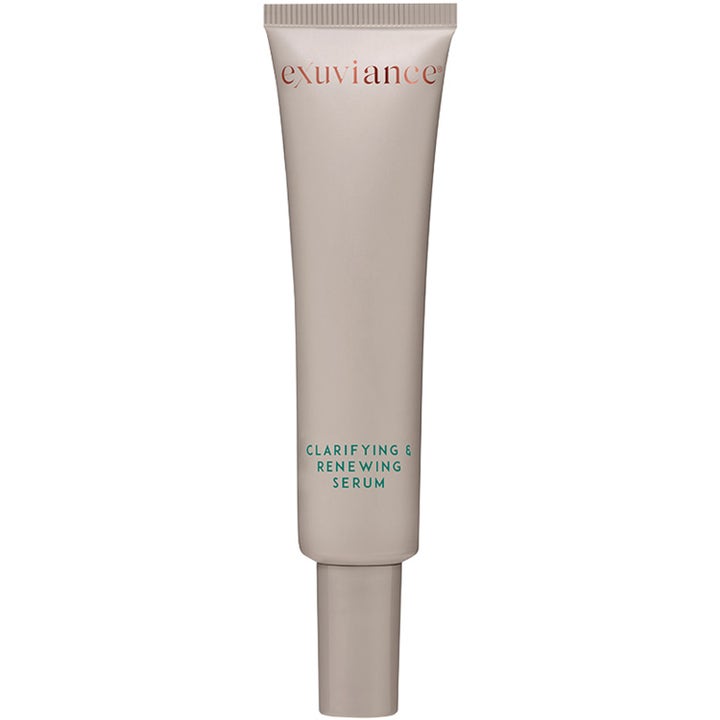 Exuviance Clarifying & Renewing Serum kirkastava ja uudistava seerumi beigessä tuubissa turkoosilla tekstillä.