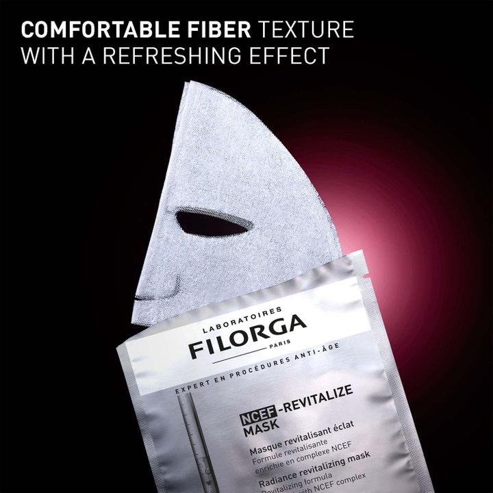 Filorga NCEF-Revitalize 20 ml elvyttävä kangasnaamio hopeisessa pakkauksessa, jossa on pehmeä kuitumateriaali.