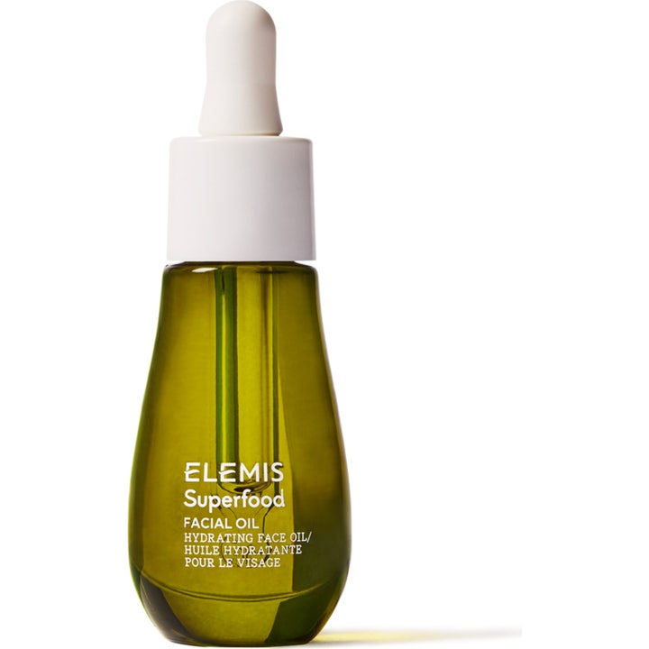 Elemis Superfood Facial Oil 15 ml kosteuttava kasvoöljy vihreässä lasipullossa valkoisella pipetillä.