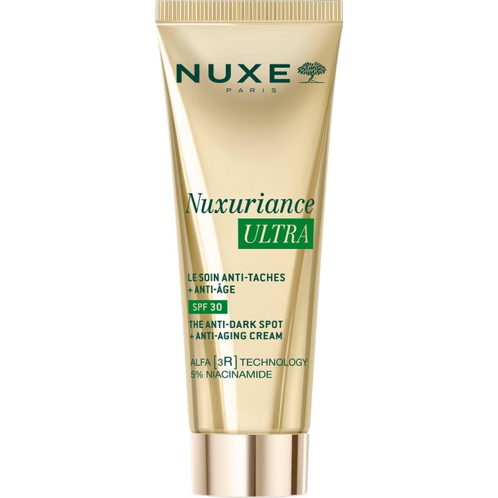 Nuxe Nuxuriance Ultra SPF 30 anti-age kasvovoide häivyttää pigmenttiläiskiä niasiiniamidin avulla kultaisessa tuubissa.