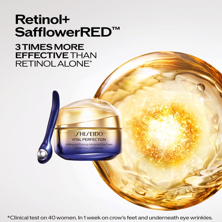 Shiseido Vital Perfection Eye Cream 15 ml kiinteyttävä silmänympärysvoide, kultainen purkki ja hehkuva Retinol+ tausta.