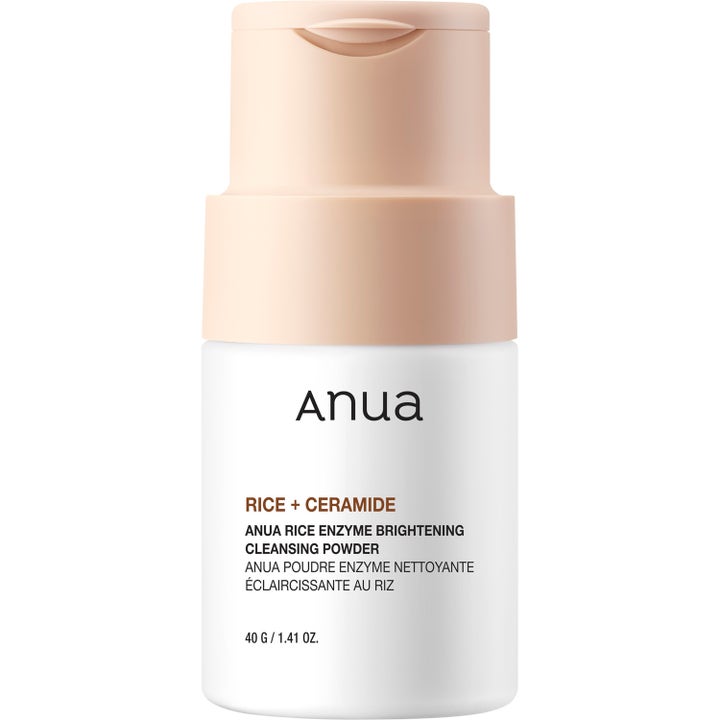 Anua Rice Enzyme Brightening Cleansing Powder 40g kirkastava puhdistusjauhe valkoinen pullo persikansävyisellä korkilla
