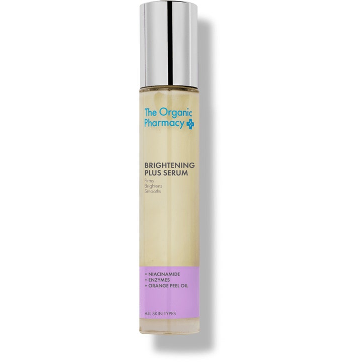 The Organic Pharmacy Brightening Plus Serum kirkastava niasiiniamidiseerumi kapeassa lasipullossa hopeisella korkilla.