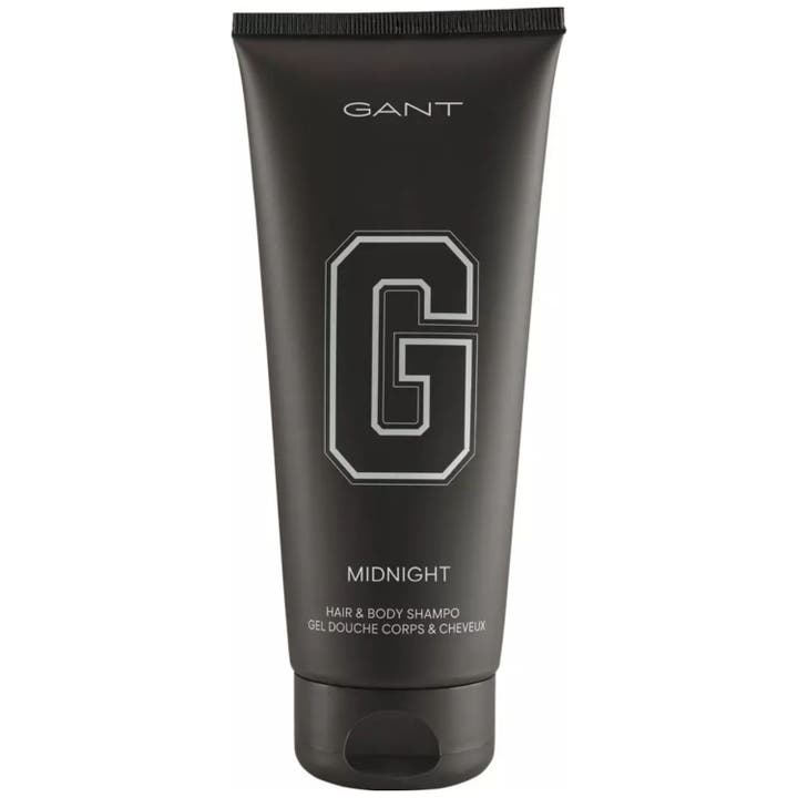 Gant Midnight Hair & Body Shampoo puhdistaa ihon ja hiukset tyylikkäässä mattamustassa tuubissa hopeisella logolla.