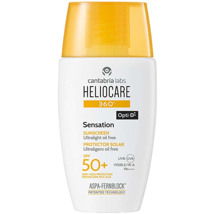 Heliocare 360 Sensation Sunscreen SPF 50+ öljytön aurinkovoide antaa suojan valkoisessa pullossa keltaisella korkilla.