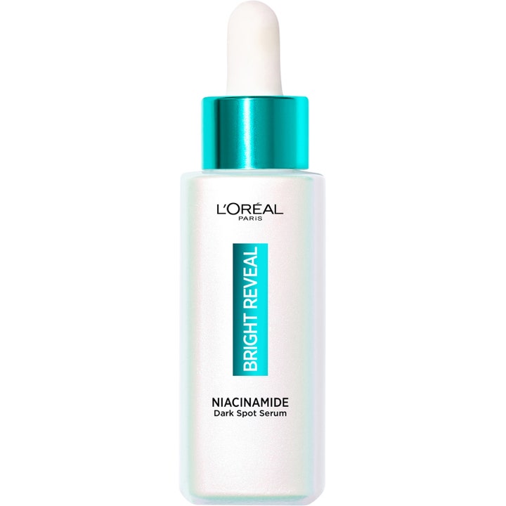 L'Oréal Paris Bright Reveal Niacinamide Dark Spot Serum pigmenttiläiskiä häivyttävä seerumi helmiäishohtoisessa pullossa.