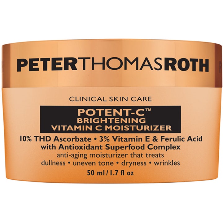 Peter Thomas Roth Potent-C Brightening Vitamin C Moisturizer 50 ml kirkastava kasvovoide oranssissa purkissa kuparikannella.
