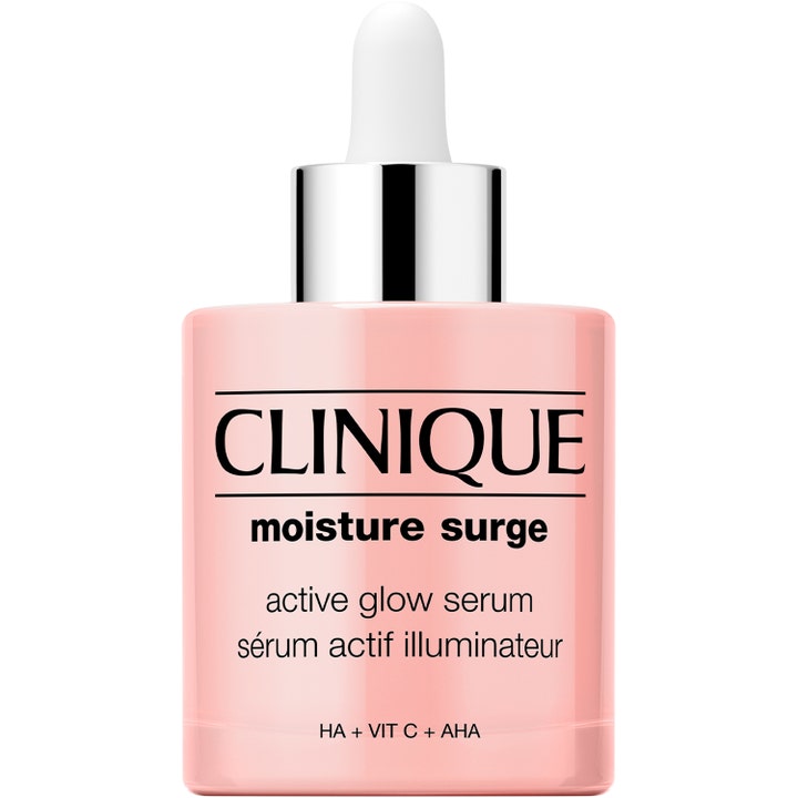 Clinique Moisture Surge Active Glow Serum heleyttävä seerumi vaaleanpunaisessa pullossa hopeisella korkilla ja pipetillä.