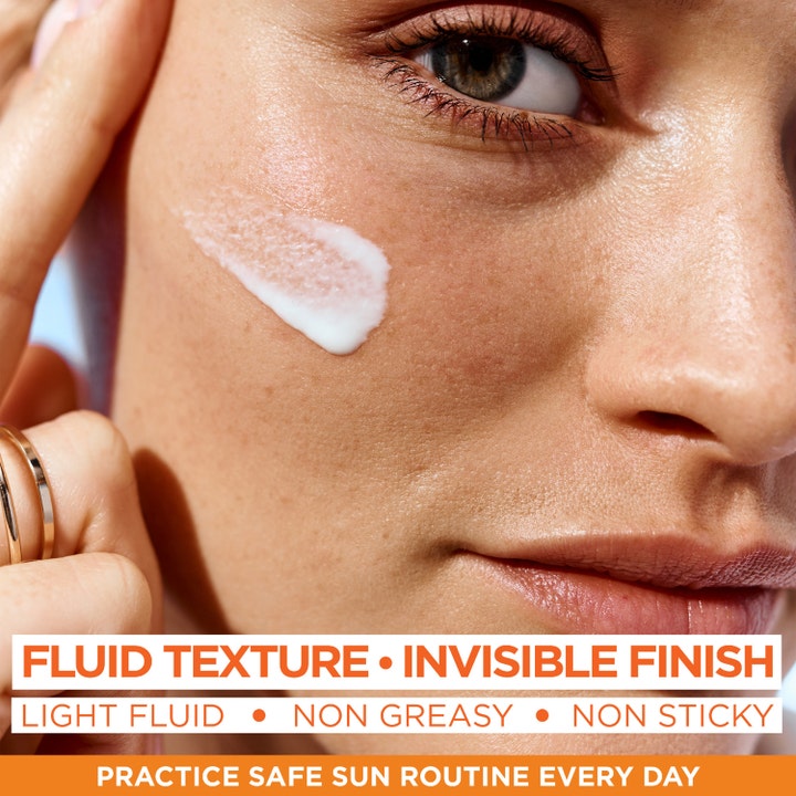 Garnier Ambre Solaire Super UV Vitamin C 40 ml aurinkosuojavoide ehkäisee pigmenttiläiskiä kevyellä fluid-koostumuksella
