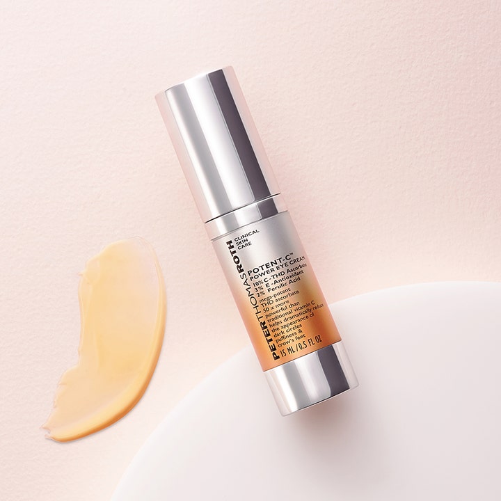 Peter Thomas Roth Potent-C Eye Cream 15 ml kirkastava silmänympärysvoide hopeisessa pullossa ja kermainen voide.